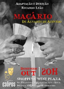 Duas mãos brindam com taças de vinho à luz de uma vela, ilustrando a atmosfera sombria e poética do espetáculo “Macário”, de Álvares de Azevedo, dirigido por Ricardo Leão.